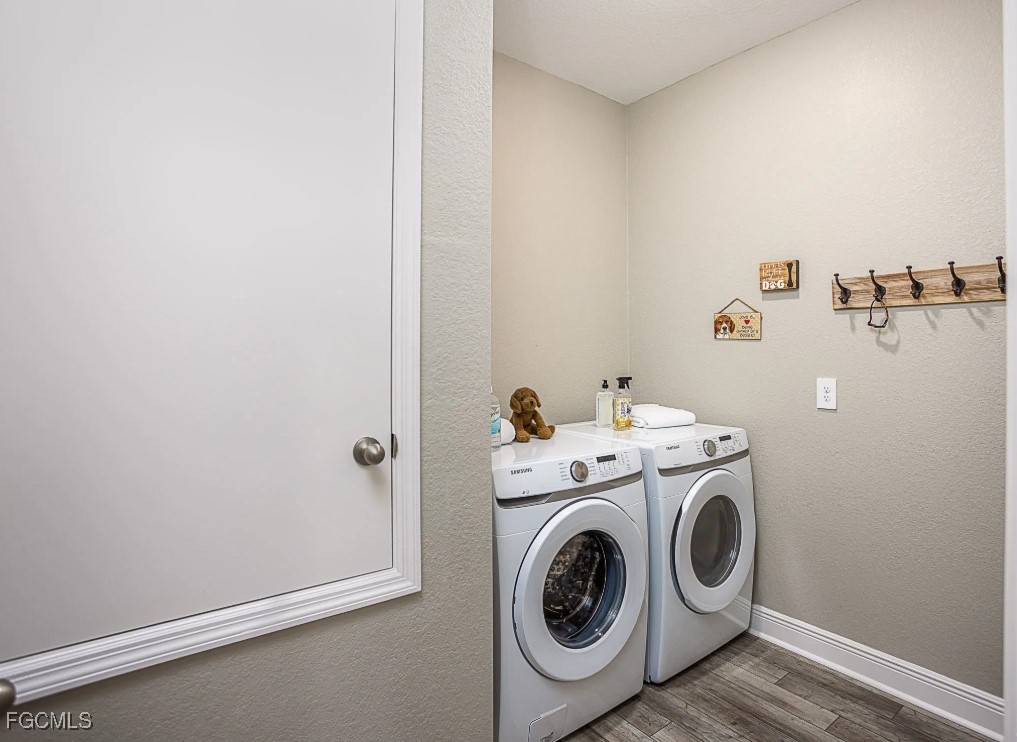 3508 14th Street Southwest Lehigh Acres, FL 33976 - Photo 19 of 23 a utility room with dryer and washer