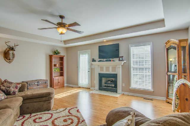 4655 Dugger Road Culleoka, TN 38451 - Photo 5 of 20 Living Room has lots of natural light and an exit door to the deck.