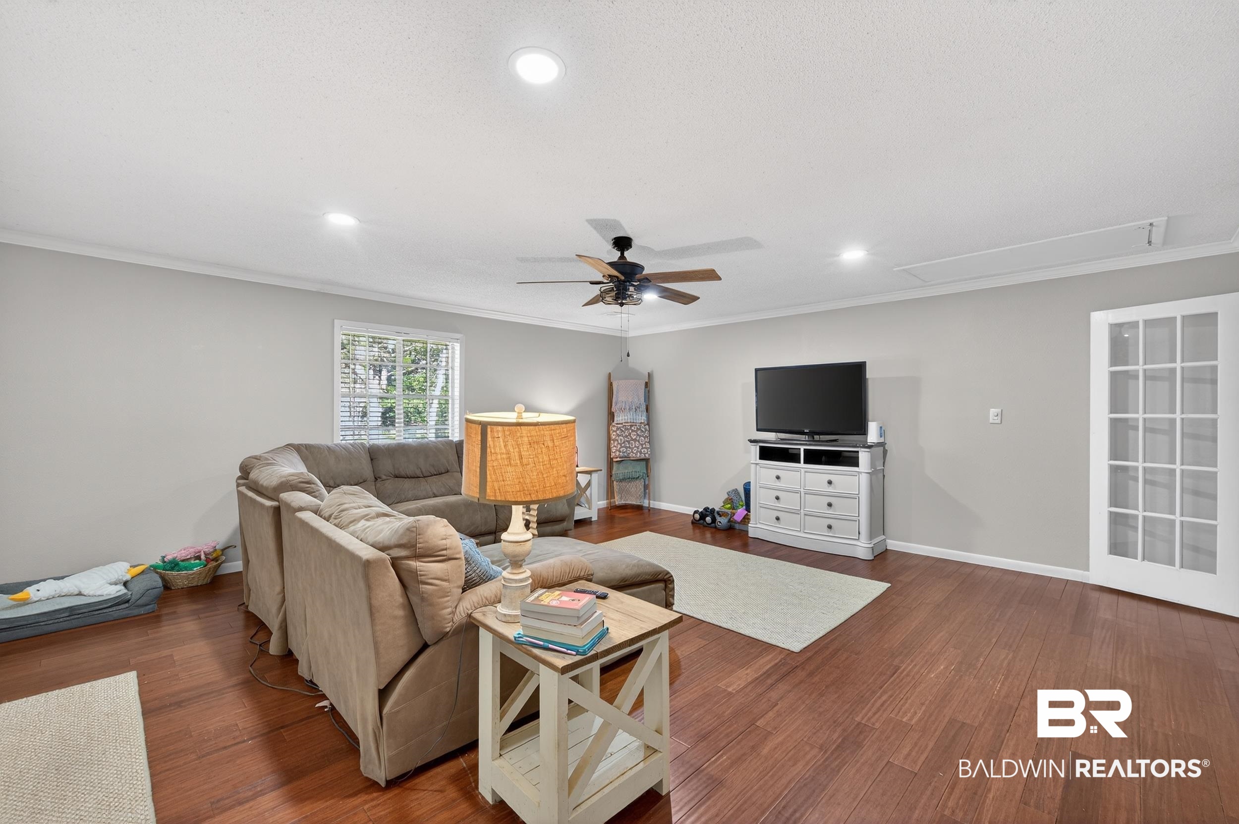 46006 Pecan Lane Bay Minette, AL 36507 - Photo 10 of 40 Living area with ornamental molding, recessed lighting, wood finished floors, and ceiling fan
