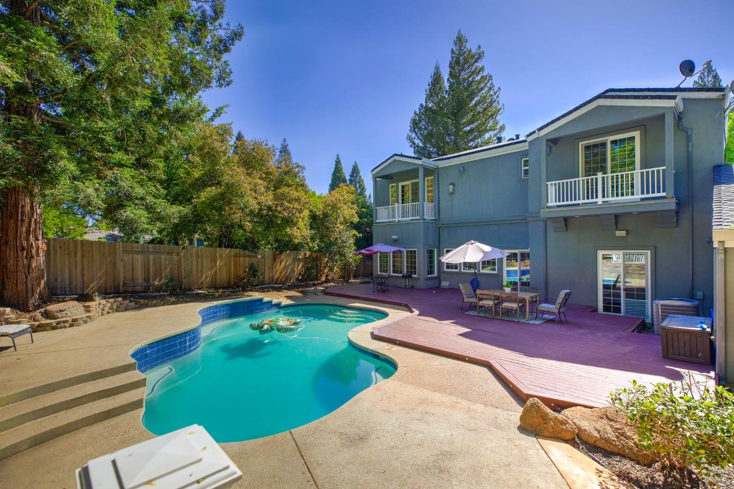 3998 Rawhide Road Rocklin, CA 95677 - Photo 1 of 1 a view of a house with backyard porch and sitting area