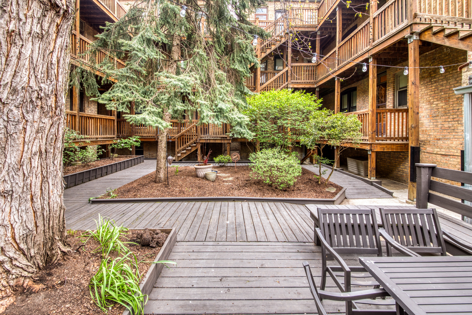 734 West Wrightwood Avenue, Unit 3 Chicago, IL 60614 - Photo 1 of 1 a view of a house with a patio