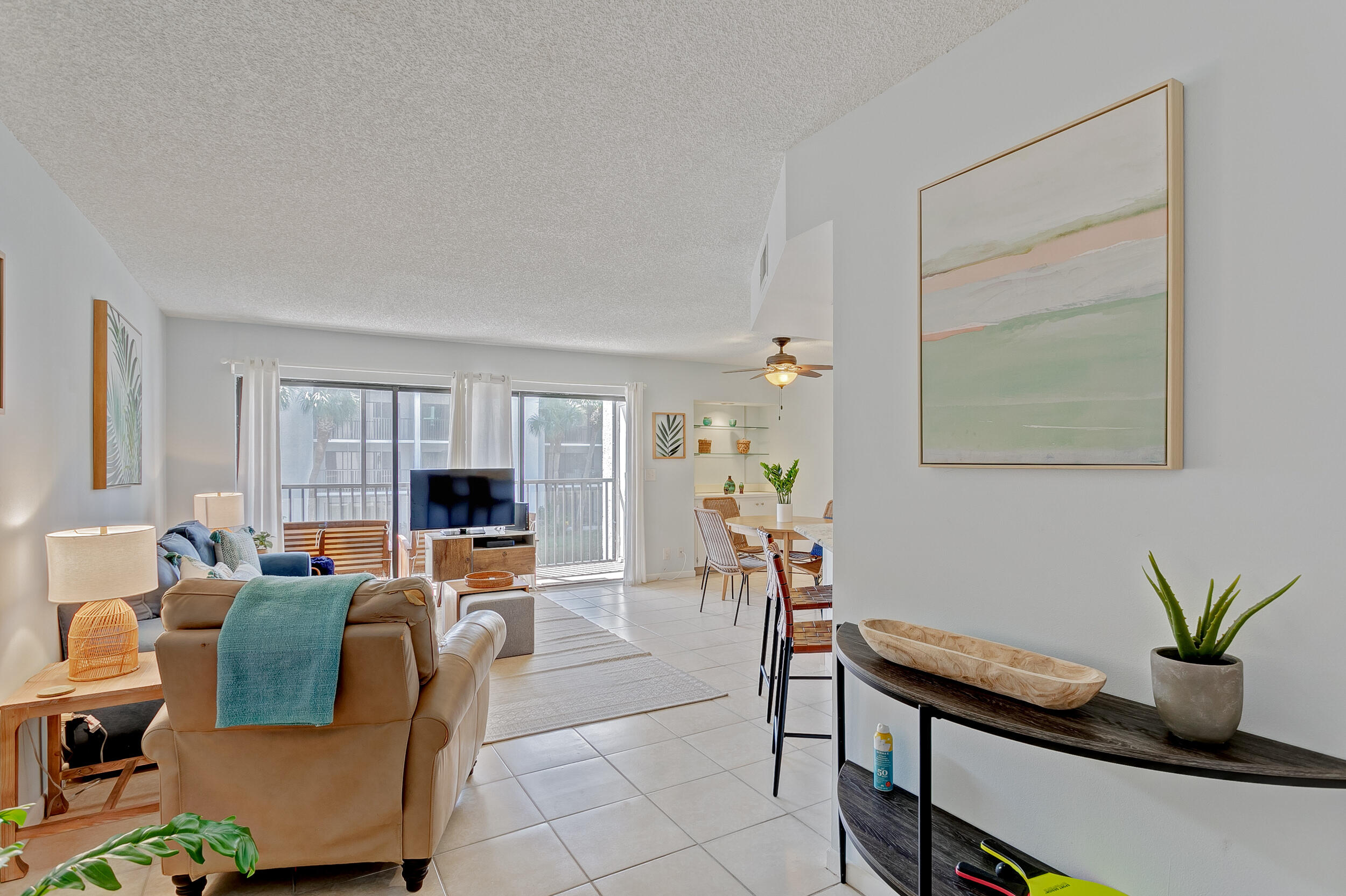 1605 Highway 1, Unit A204 Jupiter, FL 33477 - Photo 6 of 43 ENTRY TO LIVING ROOM