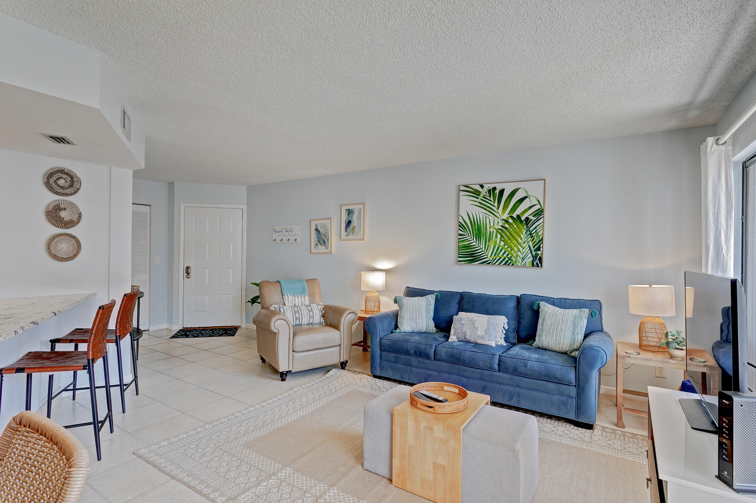 1605 Highway 1, Unit A204 Jupiter, FL 33477 - Photo 9 of 43 LIVING ROOM TO FRONT DOOR