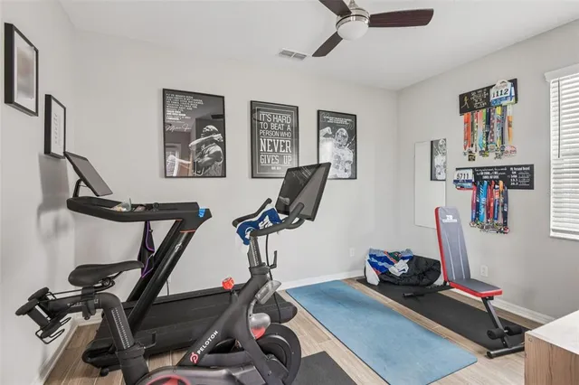 an aerial view of residential houses with outdoor space