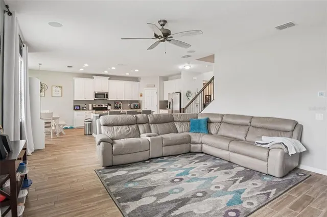 a view of swimming pool with outdoor seating