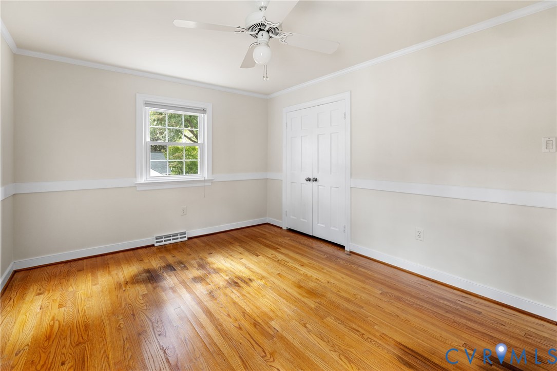 10062 Rinker Drive Mechanicsville, VA 23116 - Photo 15 of 34 wooden floor in an empty room with a window