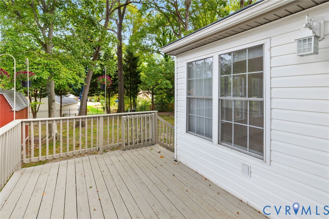 10062 Rinker Drive Mechanicsville, VA 23116 - Photo 21 of 34 a view of balcony with wooden floor