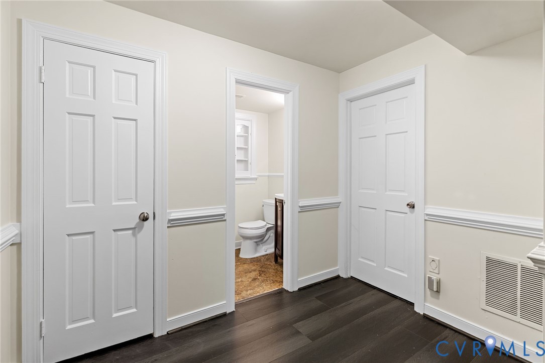 10062 Rinker Drive Mechanicsville, VA 23116 - Photo 24 of 34 an empty room with wooden floor