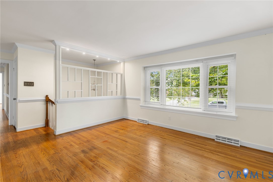 10062 Rinker Drive Mechanicsville, VA 23116 - Photo 6 of 34 a view of empty room with wooden floor and fan