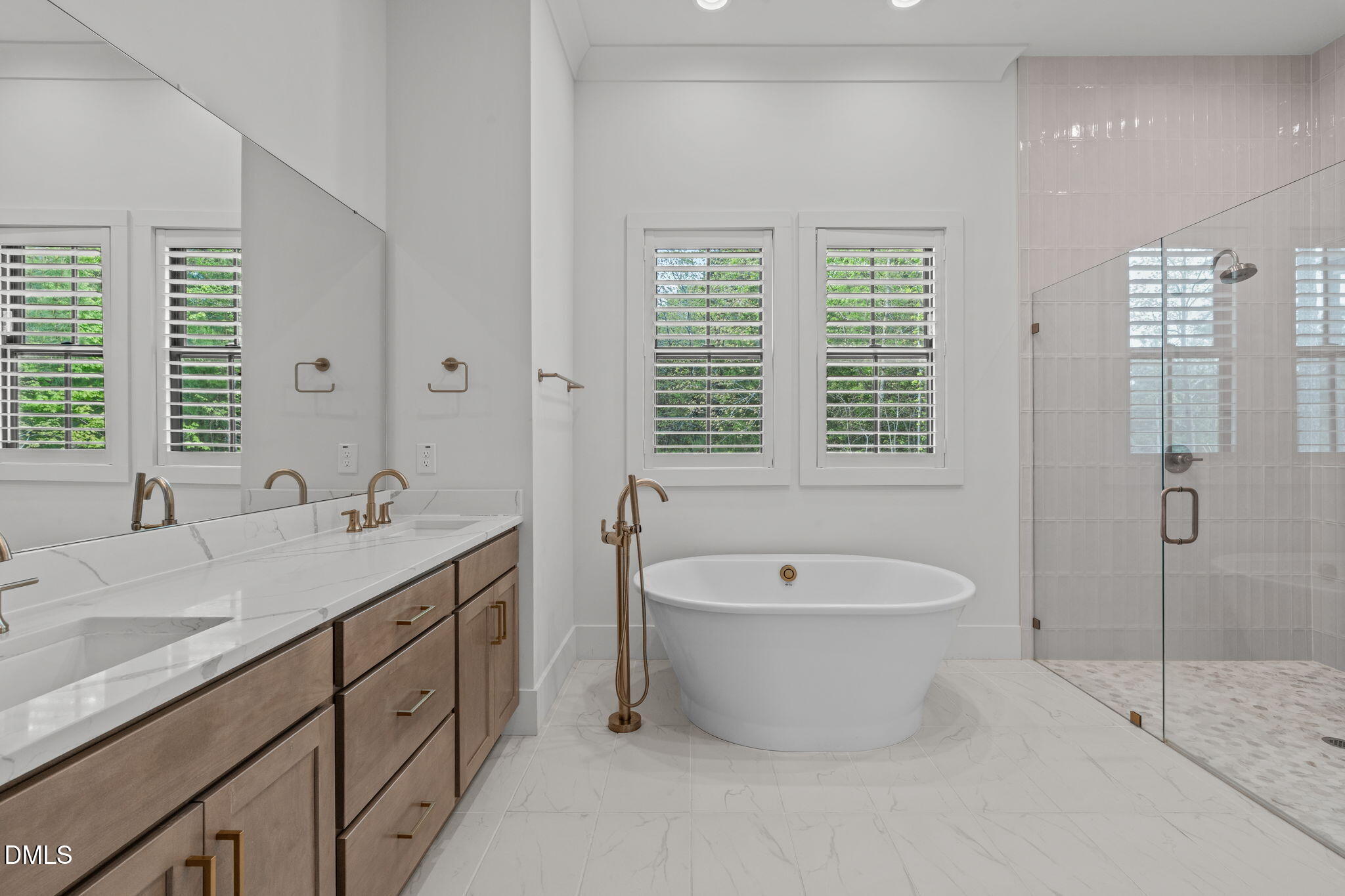 5005 Ten-Ten Road Apex, NC 27539 - Photo 20 of 60 Bright window for natural light, dual sink vanity with ample storage, plantation shutters.