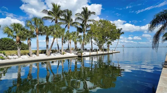 a view of a swimming pool with a patio