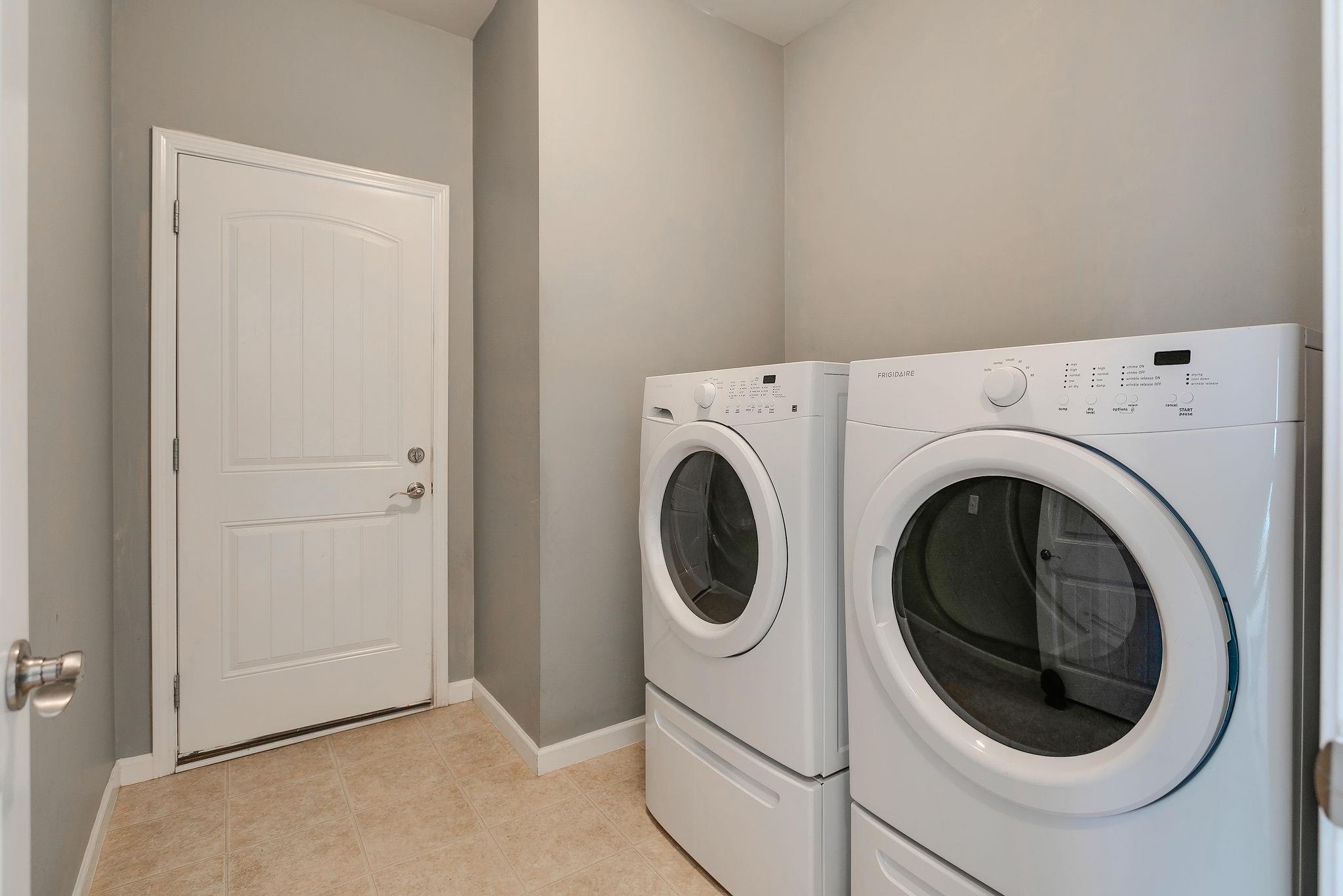 4020 Pendleton Drive Spring Hill, TN 37174 - Photo 22 of 28 Front-Load Washer and Dryer Remains and is located in mud room off the garage.