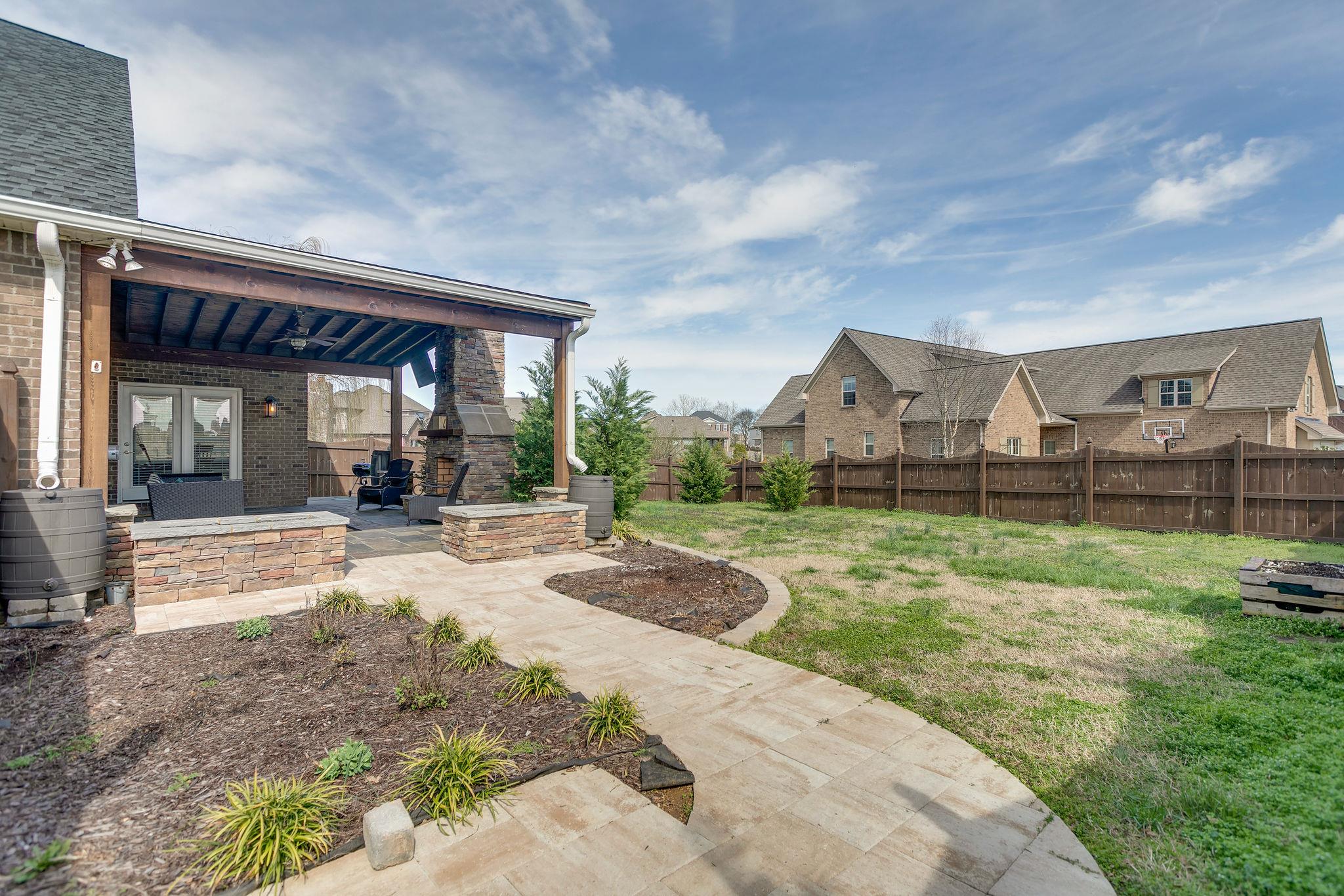 4020 Pendleton Drive Spring Hill, TN 37174 - Photo 28 of 28 Knock-Out Roses Stay. This home is a gardener's Dream. 3 50-gallon rain barrels come with the property.