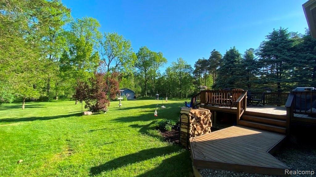 8370 Rustic Trail Linden, MI 48451 - Photo 40 of 46 Spacious deck.jpg