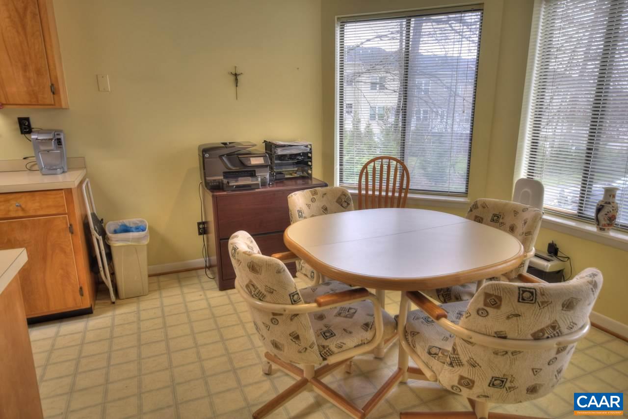 1201 Chatham Ridge Charlottesville, VA 22901 - Photo 8 of 17 a dining room with furniture and wooden floor