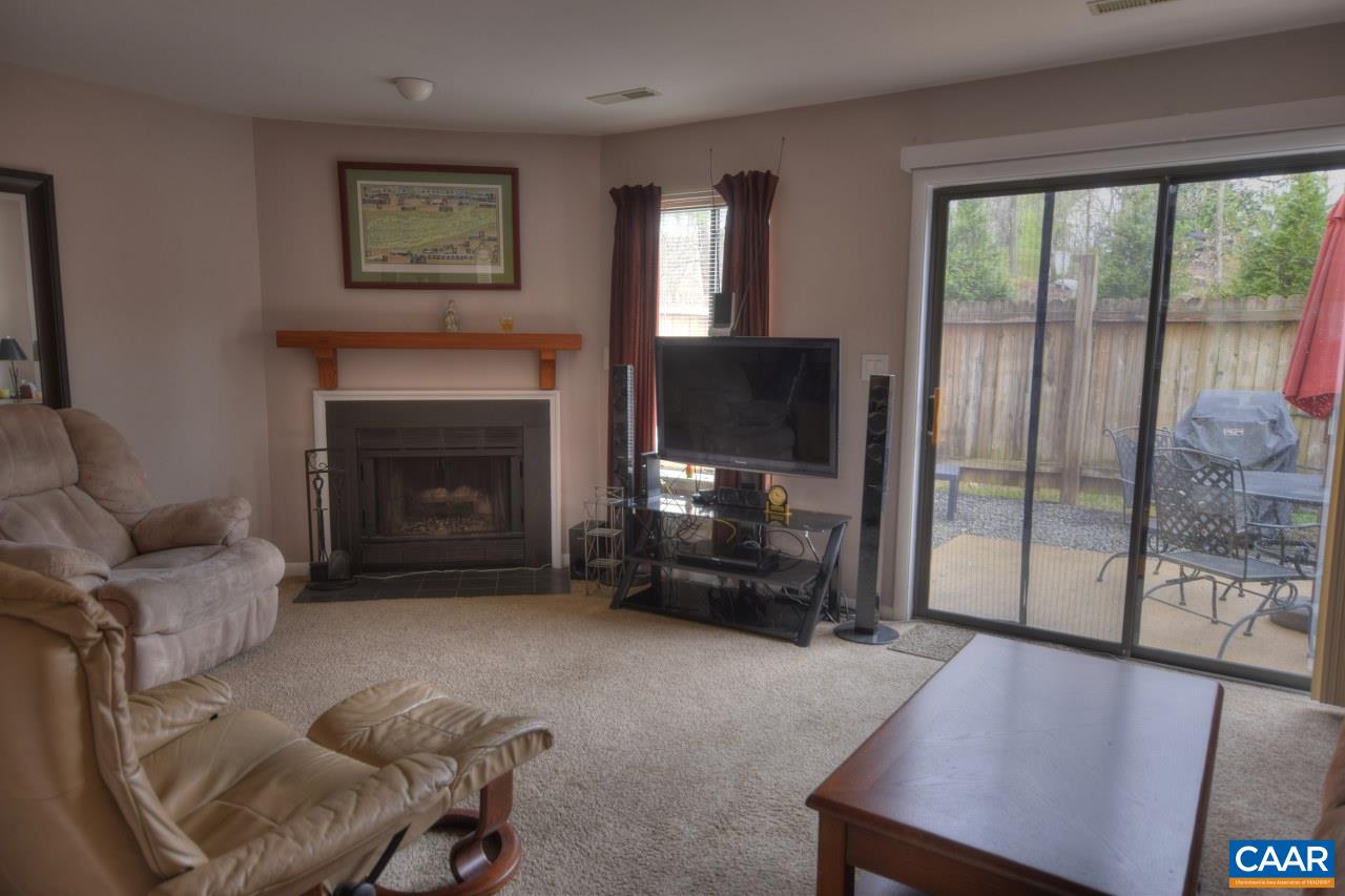 1201 Chatham Ridge Charlottesville, VA 22901 - Photo 10 of 17 a living room with furniture and a fireplace