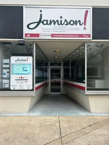 a view of a shop in a street