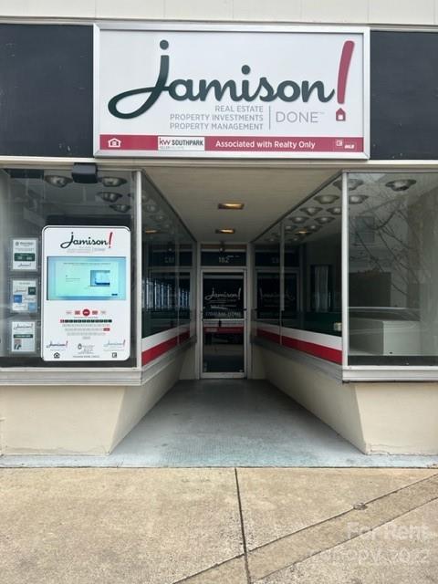 182 West Main Avenue Gastonia, NC 28052 - Photo 1 of 7 a view of a shop in a street