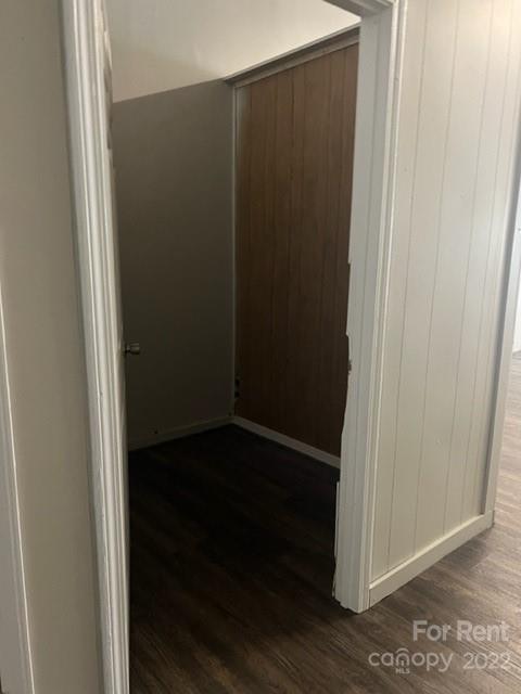 182 West Main Avenue Gastonia, NC 28052 - Photo 5 of 7 an empty room with wooden floor