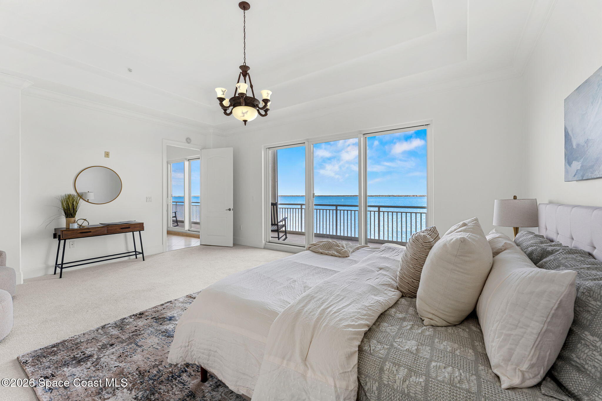 4955 Dixie Highway Northeast, Unit 802 Palm Bay, FL 32905 - Photo 22 of 30 a bedroom with a bed a window and couch