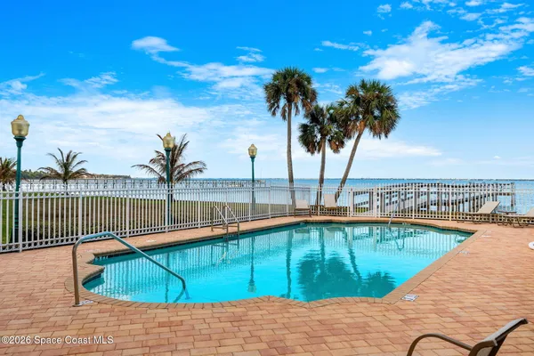 a view of a balcony with an ocean view