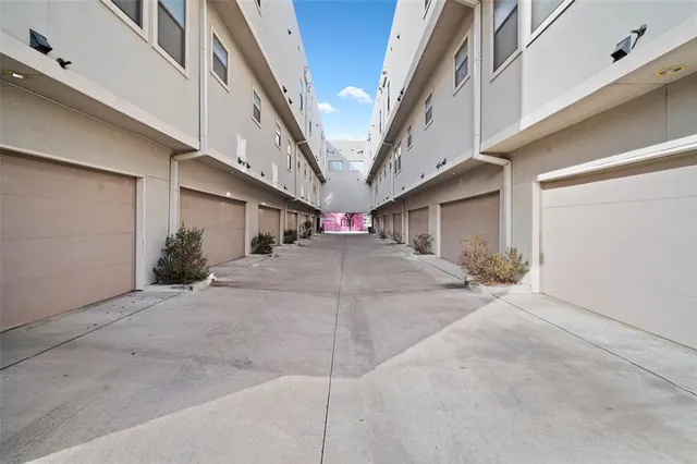 a view of a house with a street