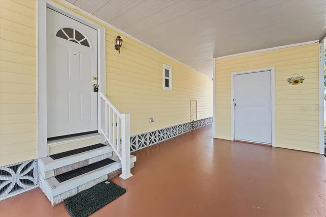 a view of a hallway with entryway