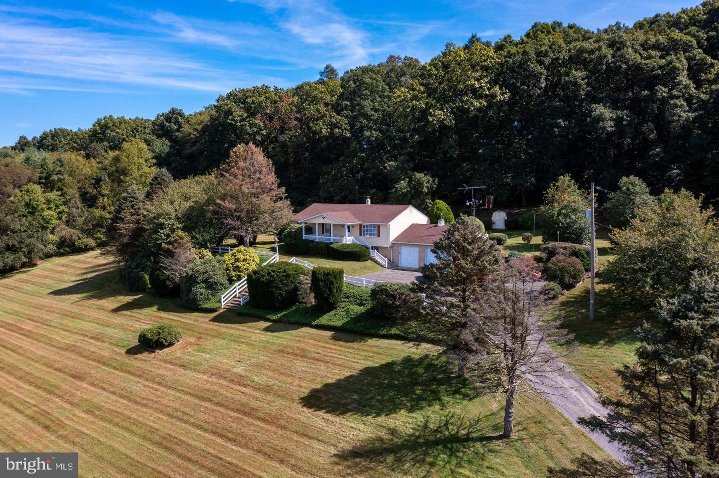 1201 Spruce Grove Road Oxford, PA 19363 - Photo 1 of 32 a view of a terrace with a garden