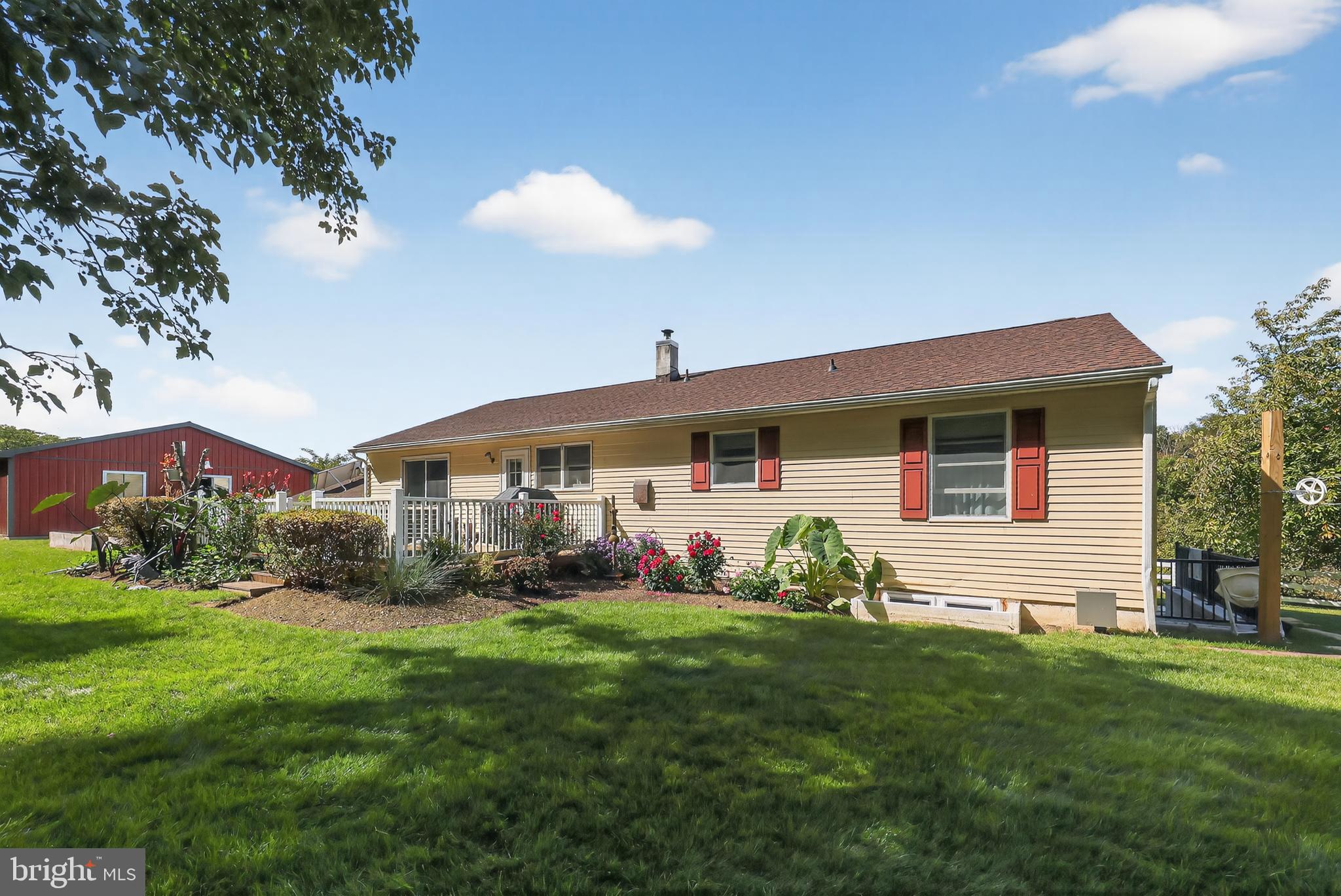 1201 Spruce Grove Road Oxford, PA 19363 - Photo 13 of 32 a front view of house with yard and green space