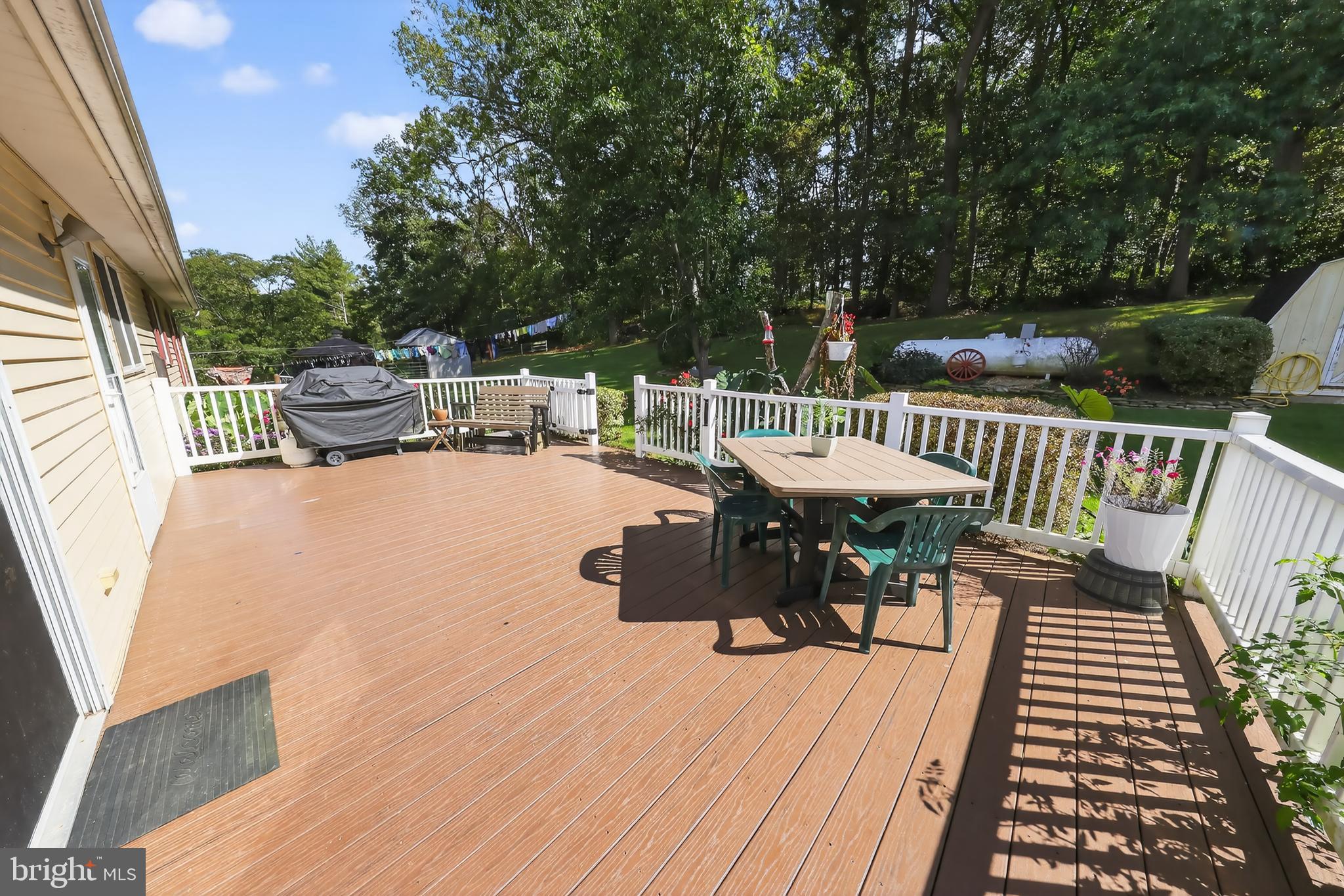 1201 Spruce Grove Road Oxford, PA 19363 - Photo 14 of 32 a view of a chairs and table on the deck