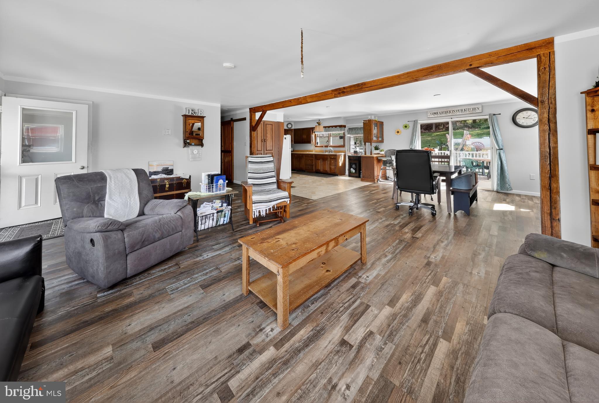 1201 Spruce Grove Road Oxford, PA 19363 - Photo 17 of 32 a living room with furniture a wooden floor and window