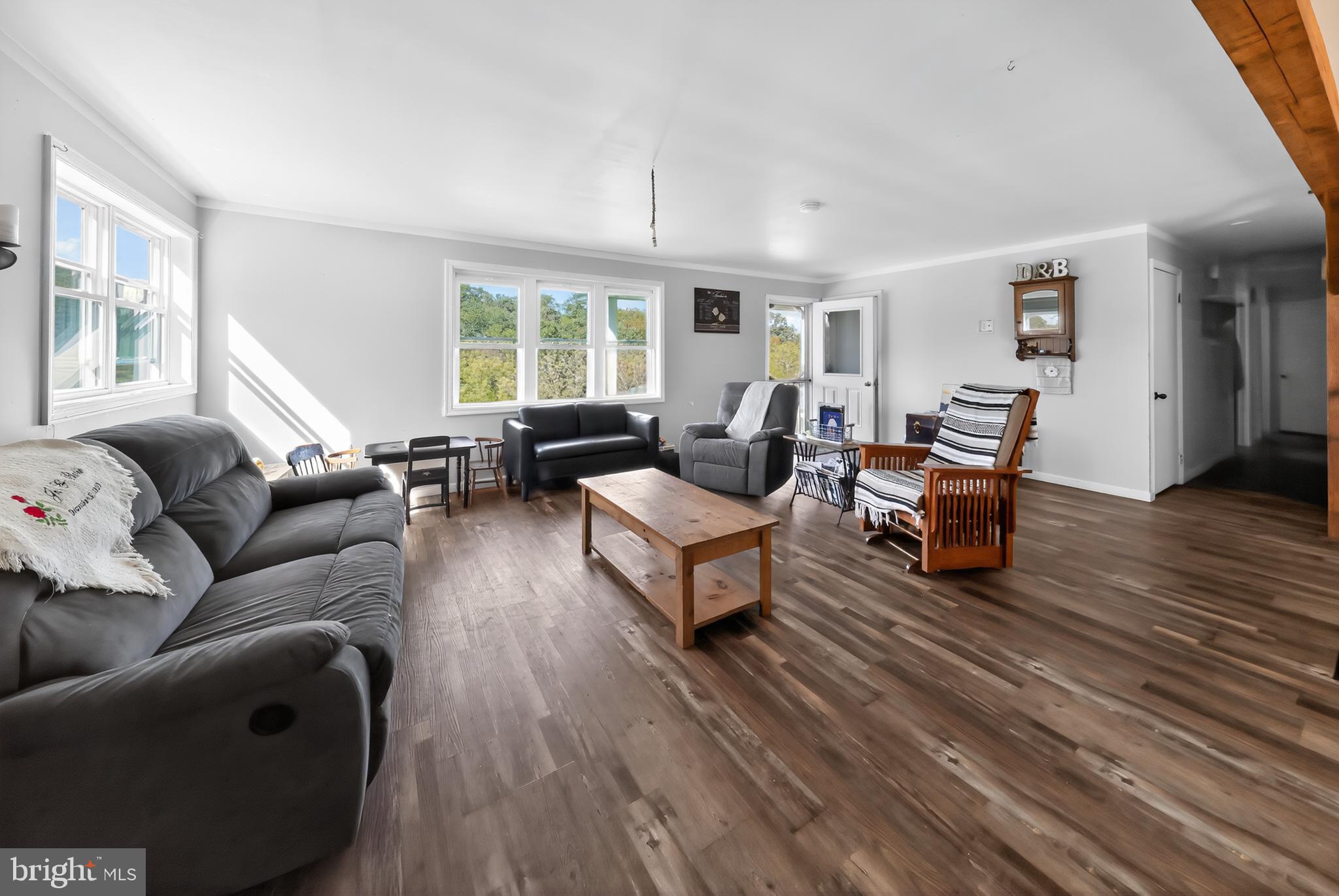 1201 Spruce Grove Road Oxford, PA 19363 - Photo 18 of 32 a living room with furniture and a wooden floor
