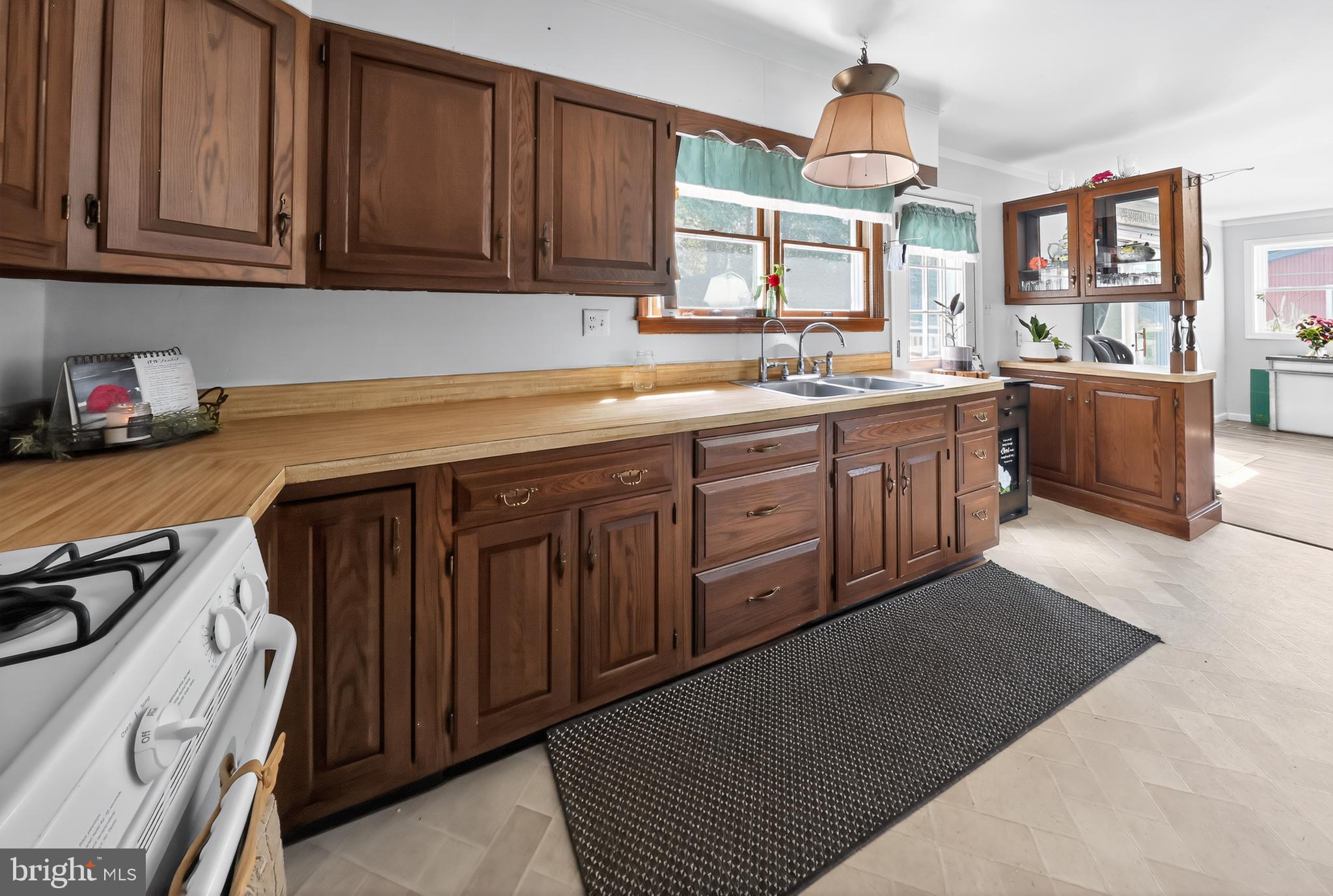 1201 Spruce Grove Road Oxford, PA 19363 - Photo 23 of 32 a kitchen with stainless steel appliances granite countertop a stove a sink and a microwave