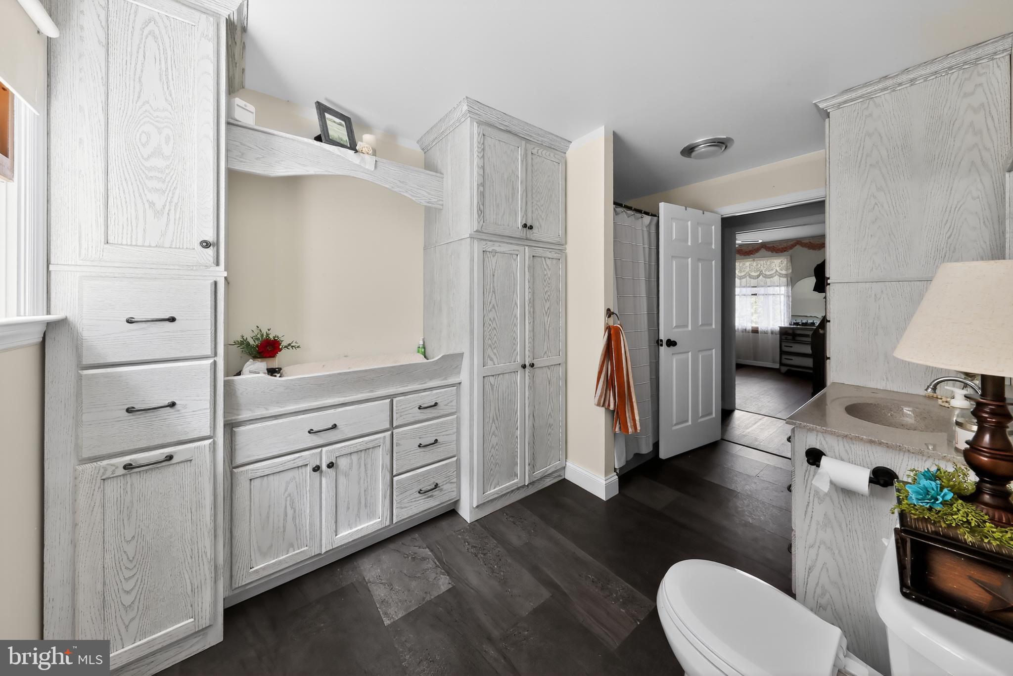 1201 Spruce Grove Road Oxford, PA 19363 - Photo 30 of 32 a spacious bathroom with double vanity and mirrors