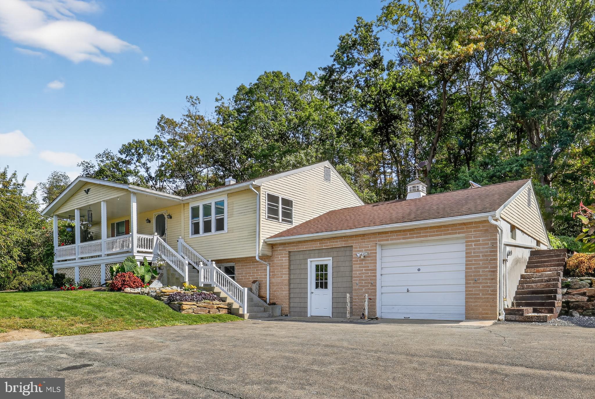 1201 Spruce Grove Road Oxford, PA 19363 - Photo 3 of 32 front view of a house with a yard