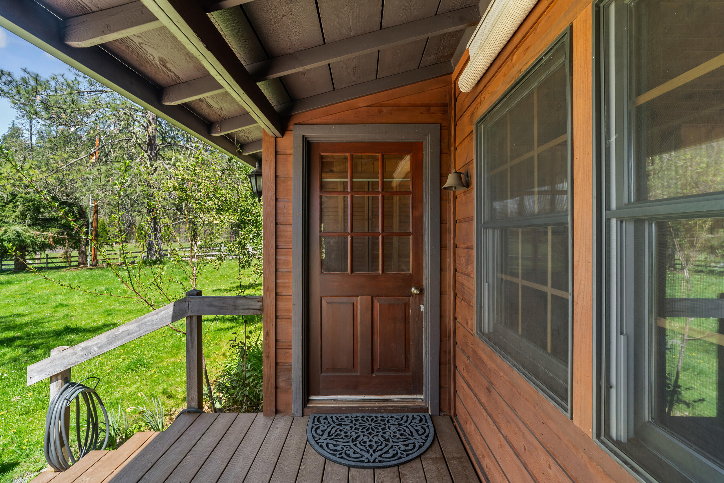 7589 Takilma Road Cave Junction, OR 97523 - Photo 10 of 54 a view of porch with a porch