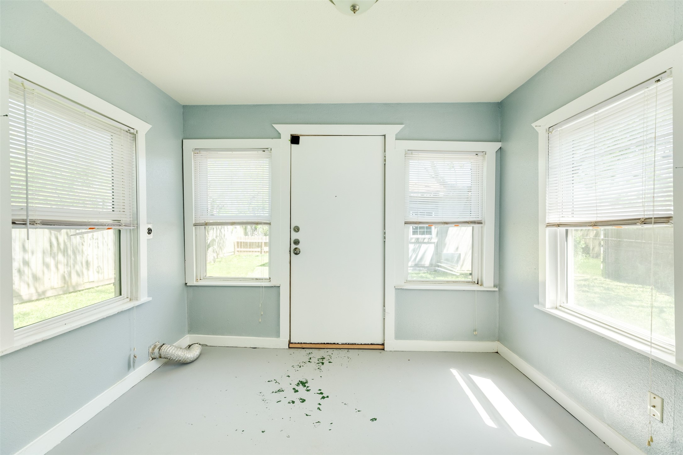 302 West 8th Street, Unit A Freeport, TX 77541 - Photo 11 of 25 an empty room with windows