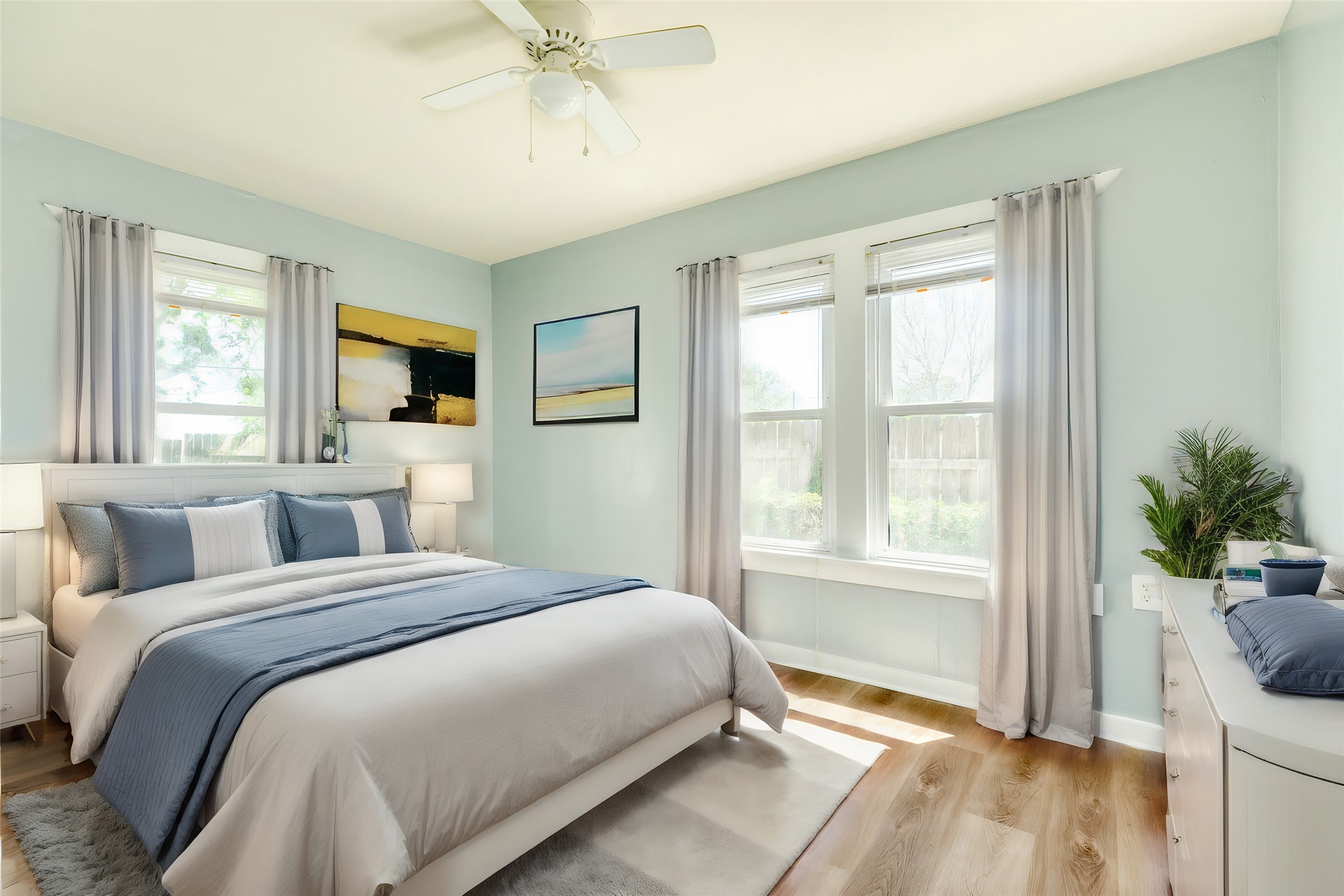 302 West 8th Street, Unit A Freeport, TX 77541 - Photo 23 of 25 a bedroom with a large bed and a window