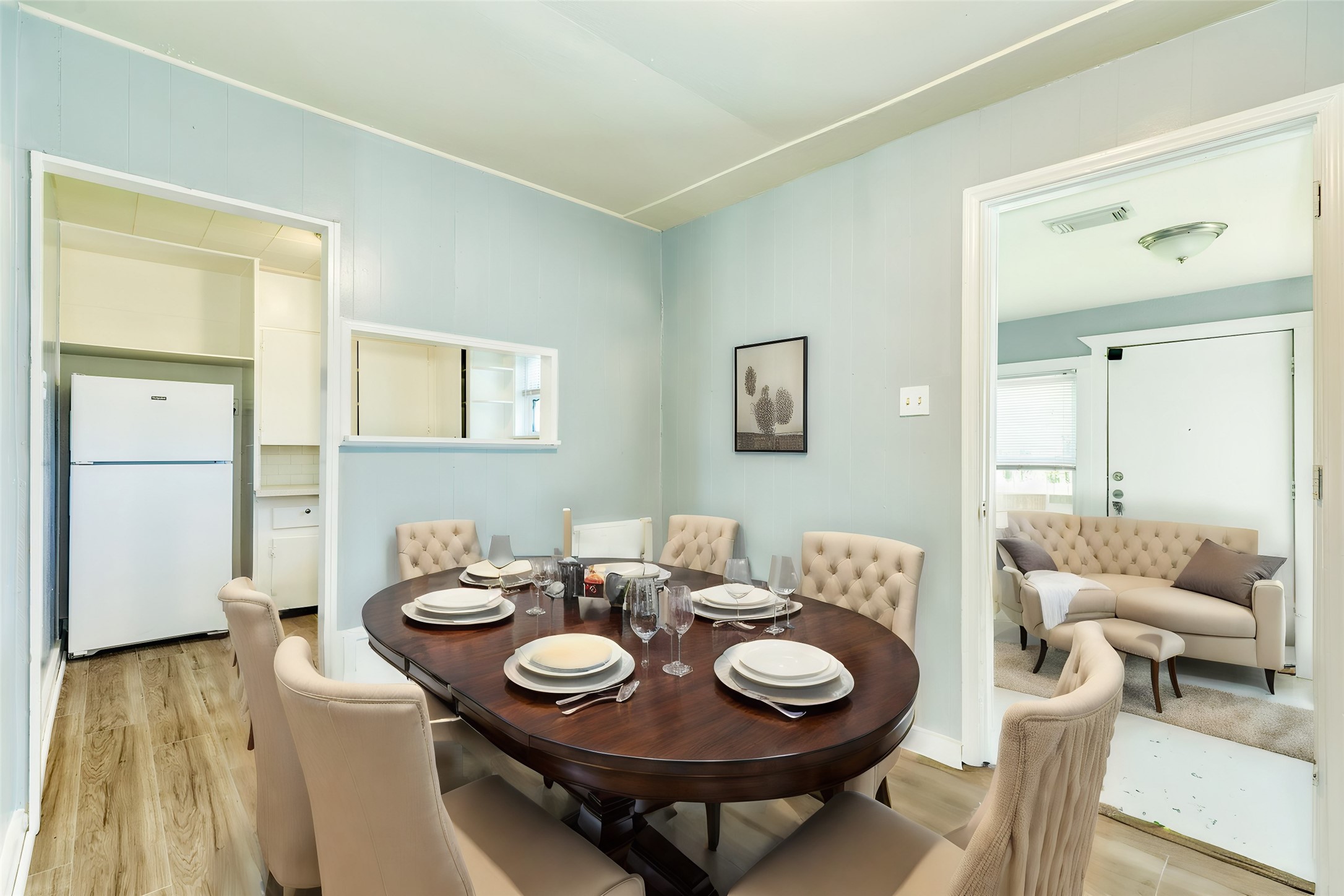 302 West 8th Street, Unit A Freeport, TX 77541 - Photo 6 of 25 a view of a dining room with furniture and wooden floor