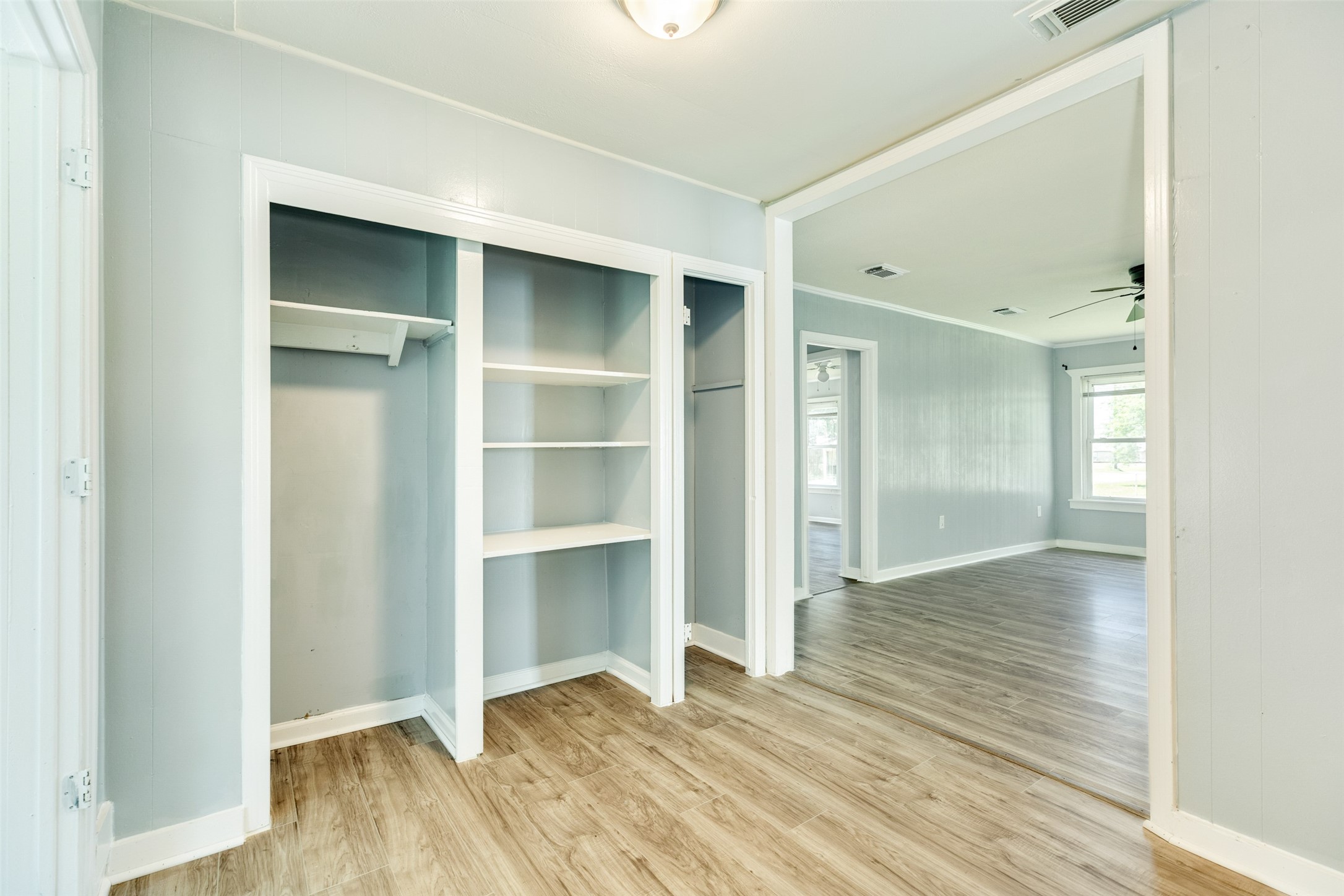 302 West 8th Street, Unit A Freeport, TX 77541 - Photo 8 of 25 a view of empty room with wooden floor