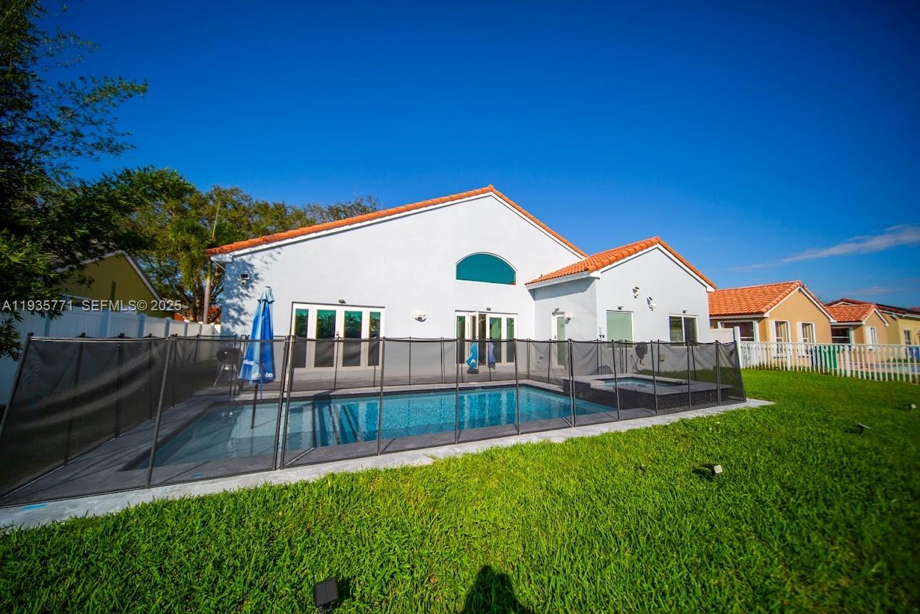 13020 Southwest 17th Court Miramar, FL 33027 - Photo 2 of 78 a view of a house with a yard and sitting area