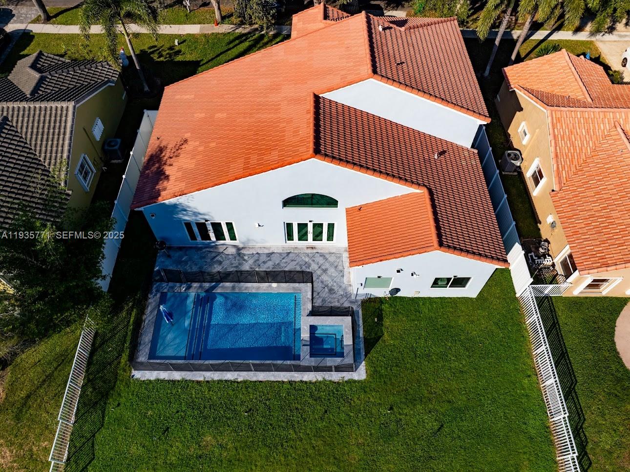 13020 Southwest 17th Court Miramar, FL 33027 - Photo 65 of 78 a front view of a house with a garden