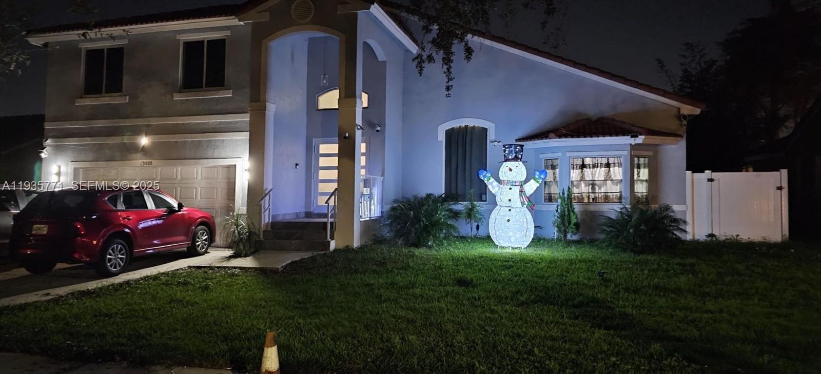 13020 Southwest 17th Court Miramar, FL 33027 - Photo 77 of 78 a front view of a house with a yard