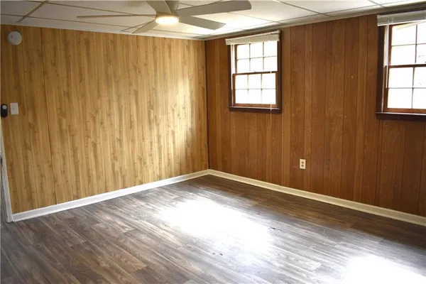an empty room with windows