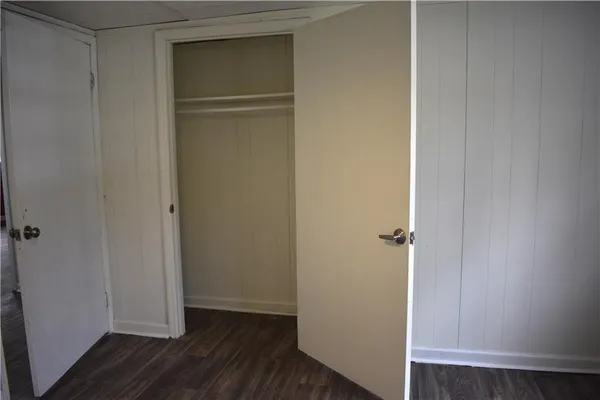 a view of front door with wooden floor