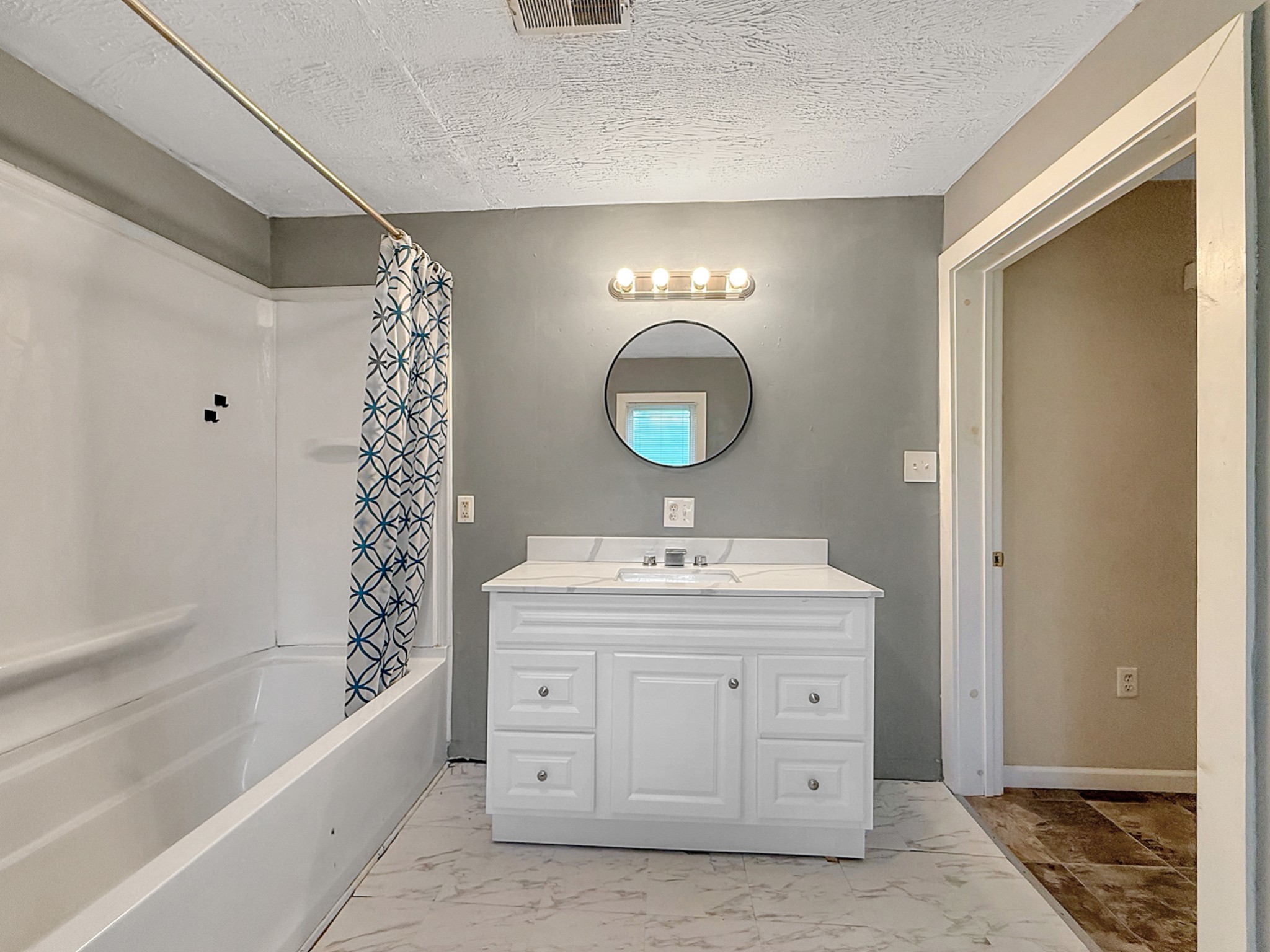 63 West Greendale Street Corbin, KY 40701 - Photo 12 of 24 a bathroom with a sink double vanity and a mirror