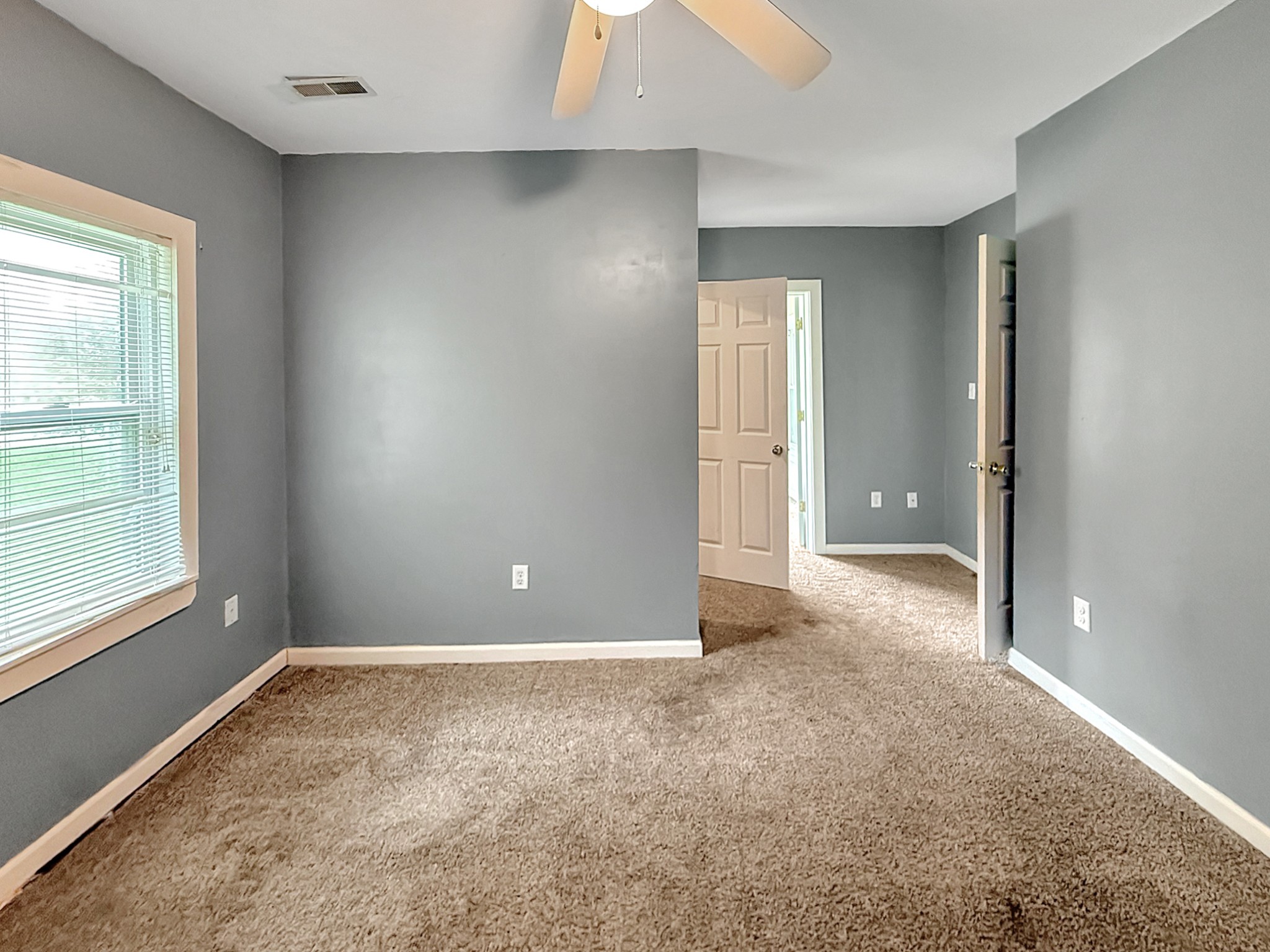 63 West Greendale Street Corbin, KY 40701 - Photo 16 of 24 an empty room with windows and closet