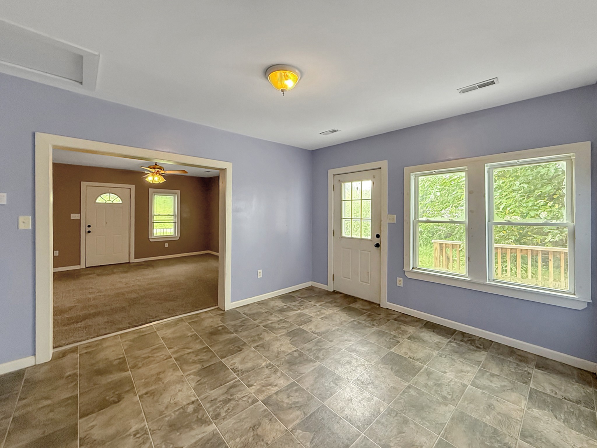 63 West Greendale Street Corbin, KY 40701 - Photo 8 of 24 a view of an empty room with window and bathroom