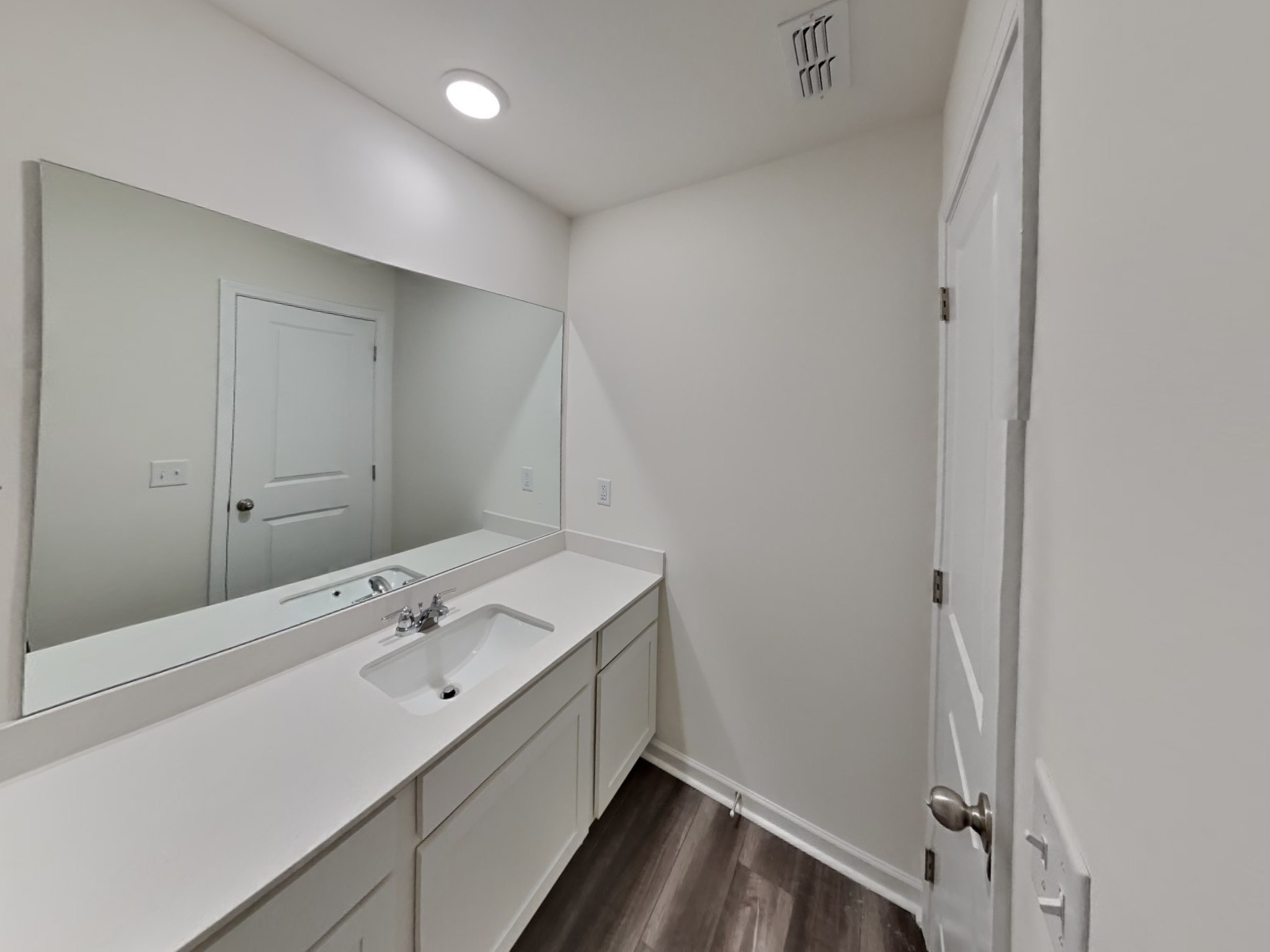 305 Nasturtium Way La Vergne, TN 37086 - Photo 18 of 22 a bathroom with a sink and a mirror