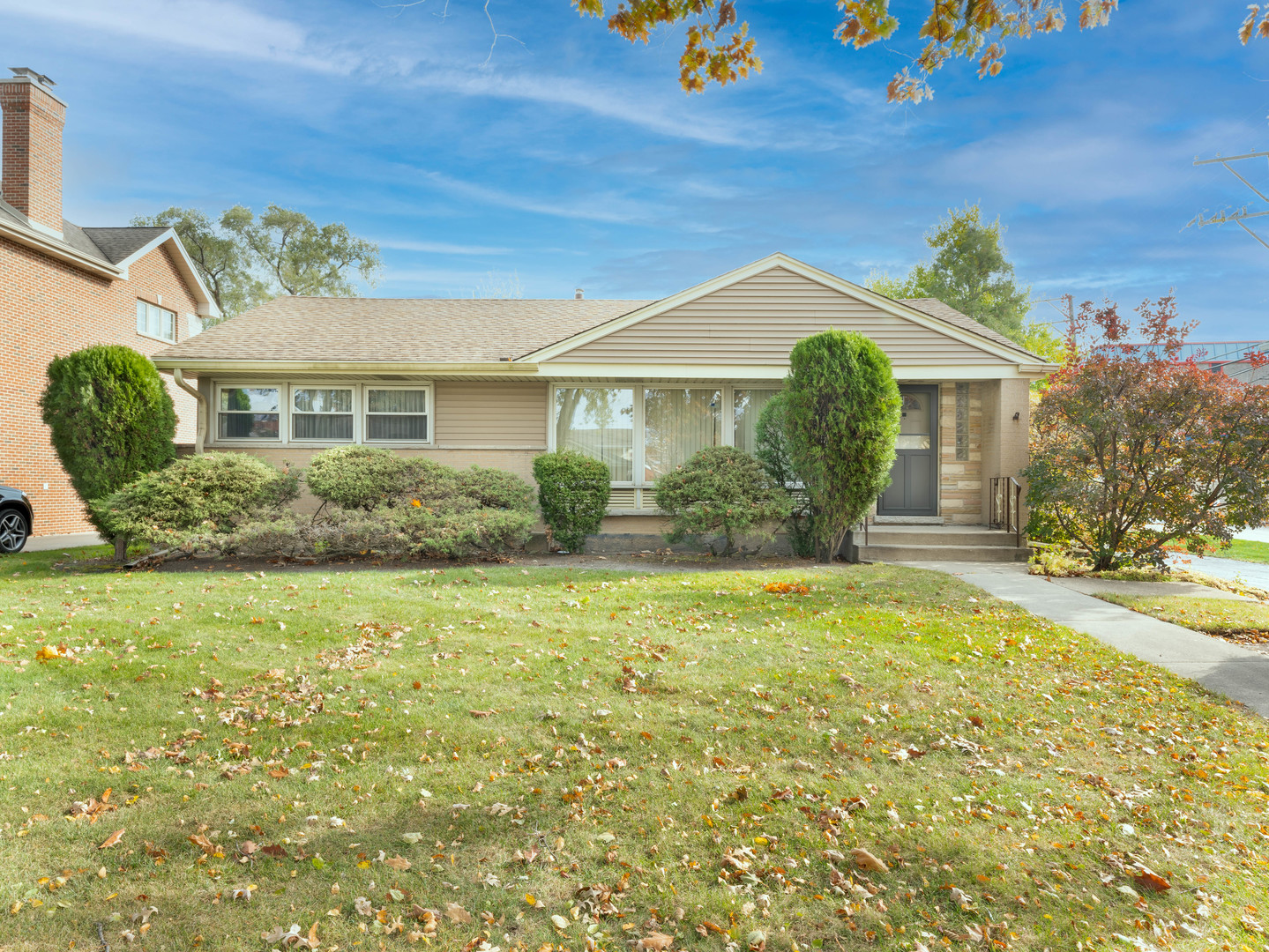 1933 South Crescent Avenue Park Ridge, IL 60068 - Photo 1 of 23 a front view of a house with garden
